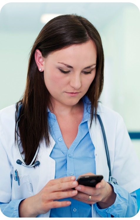 Healthcare professional reviewing a patient app