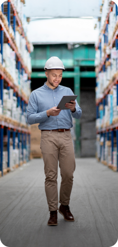 Manufacturing professional reviewing connected factory operations